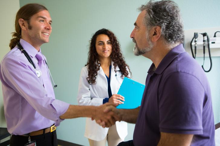 two physicians with patient